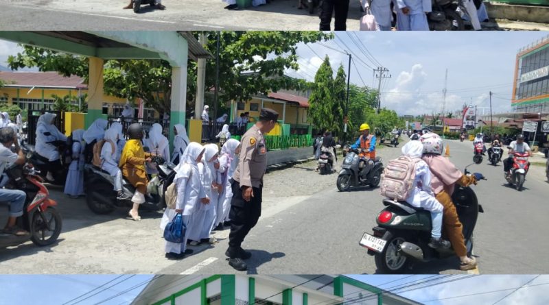 Pesonel Polsek Manggeng Gelar Kegiatan Strongpoint Bantu Anak Sekolah Nyebrang Jalan, Guna Cegah Kemacetan Serta Beri Rasa Aman Bagi Anak Sekolah dan Pengguna Jalan Pesonel Polsek Manggeng Gelar Kegiatan Strongpoint Bantu Anak Sekolah Nyebrang Jalan, Guna Cegah Kemacetan Serta Beri Rasa Aman Bagi Anak Sekolah dan Pengguna Jalan